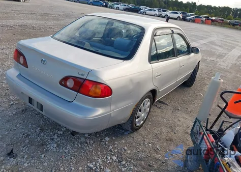 2001 Toyota Corolla Le из США, поврежденный, VIN 2T1BR12E21C470356